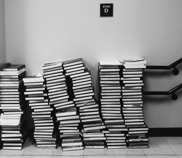 Mountain of sign-in books